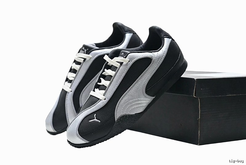 PUMA retro style black and silver sports shoes