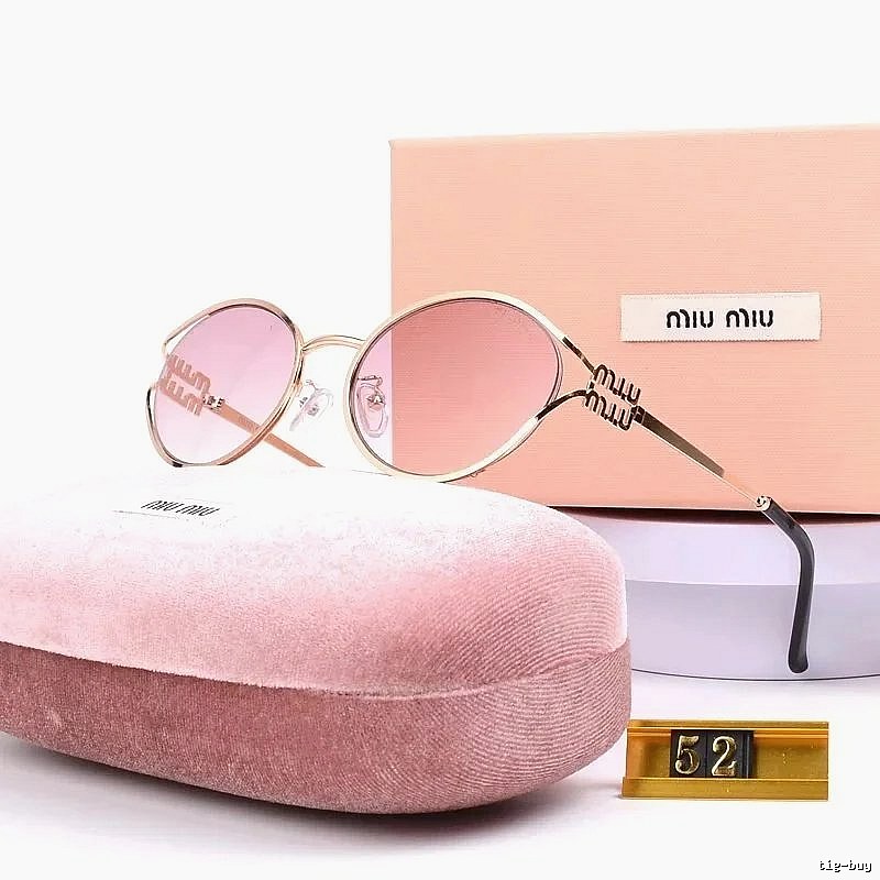 Miu Miu Statement Oversized sunglasses Black Oval Sunglasses for Easy Pairing