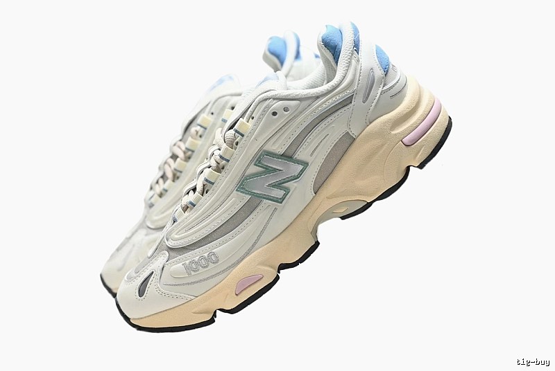 New Balance 1000 retro style gray and white shoes